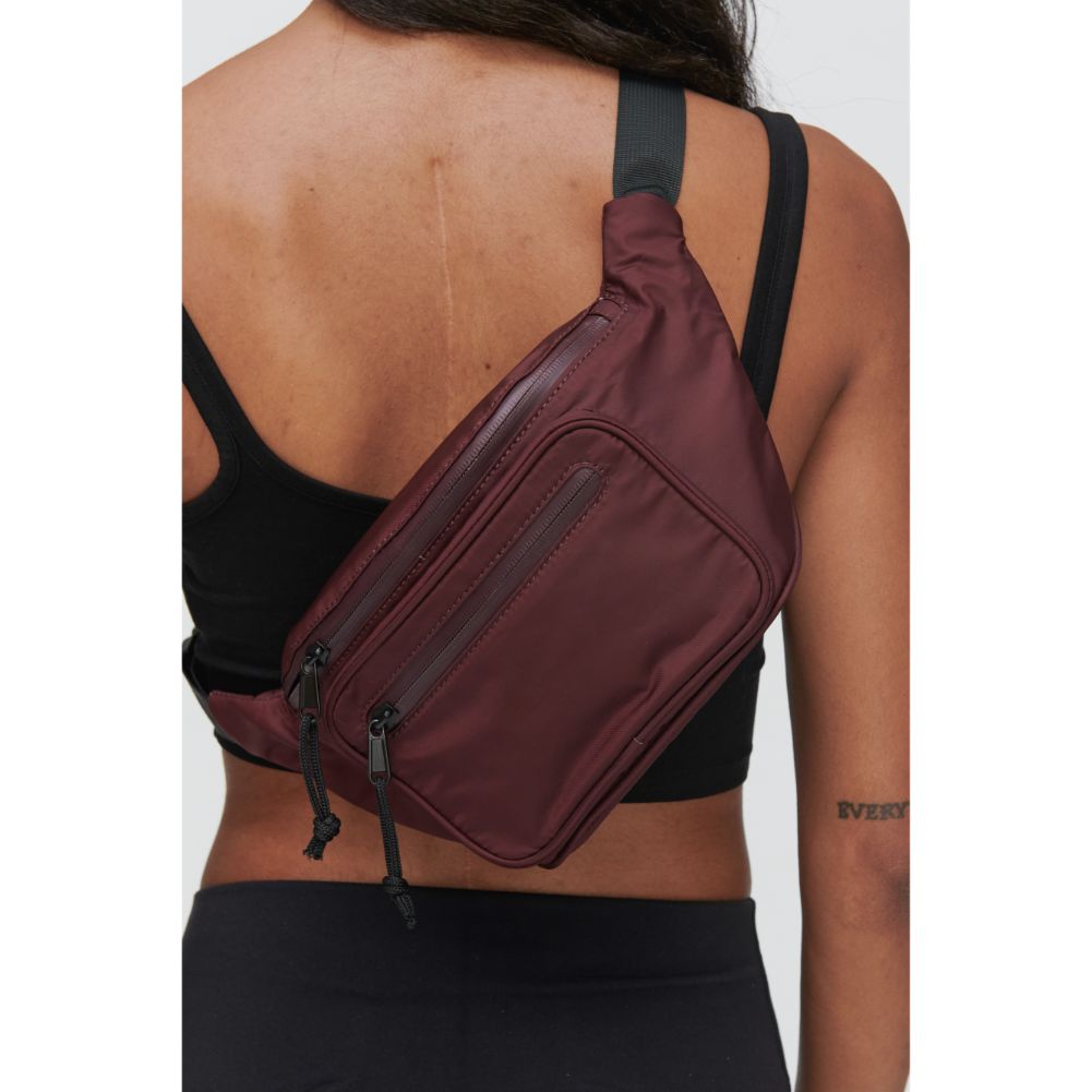 Woman wearing Burgundy Sol and Selene Hands Down Belt Bag 841764103626 View 2 | Burgundy