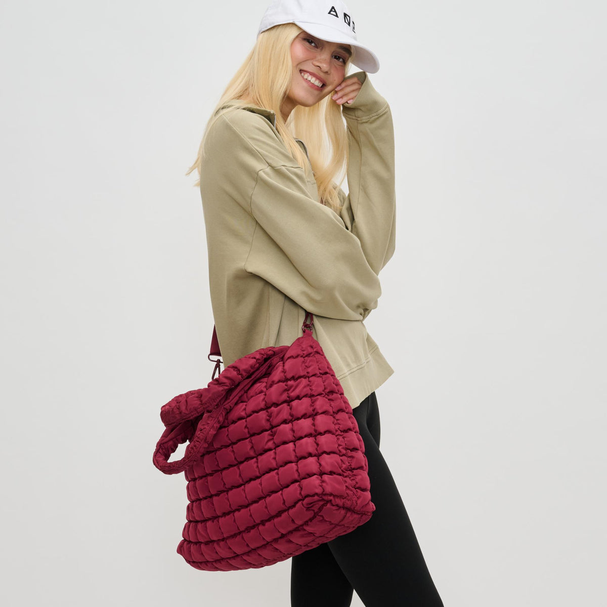 Woman wearing Burgundy Sol and Selene Elevate Hobo 841764110549 View 2 | Burgundy