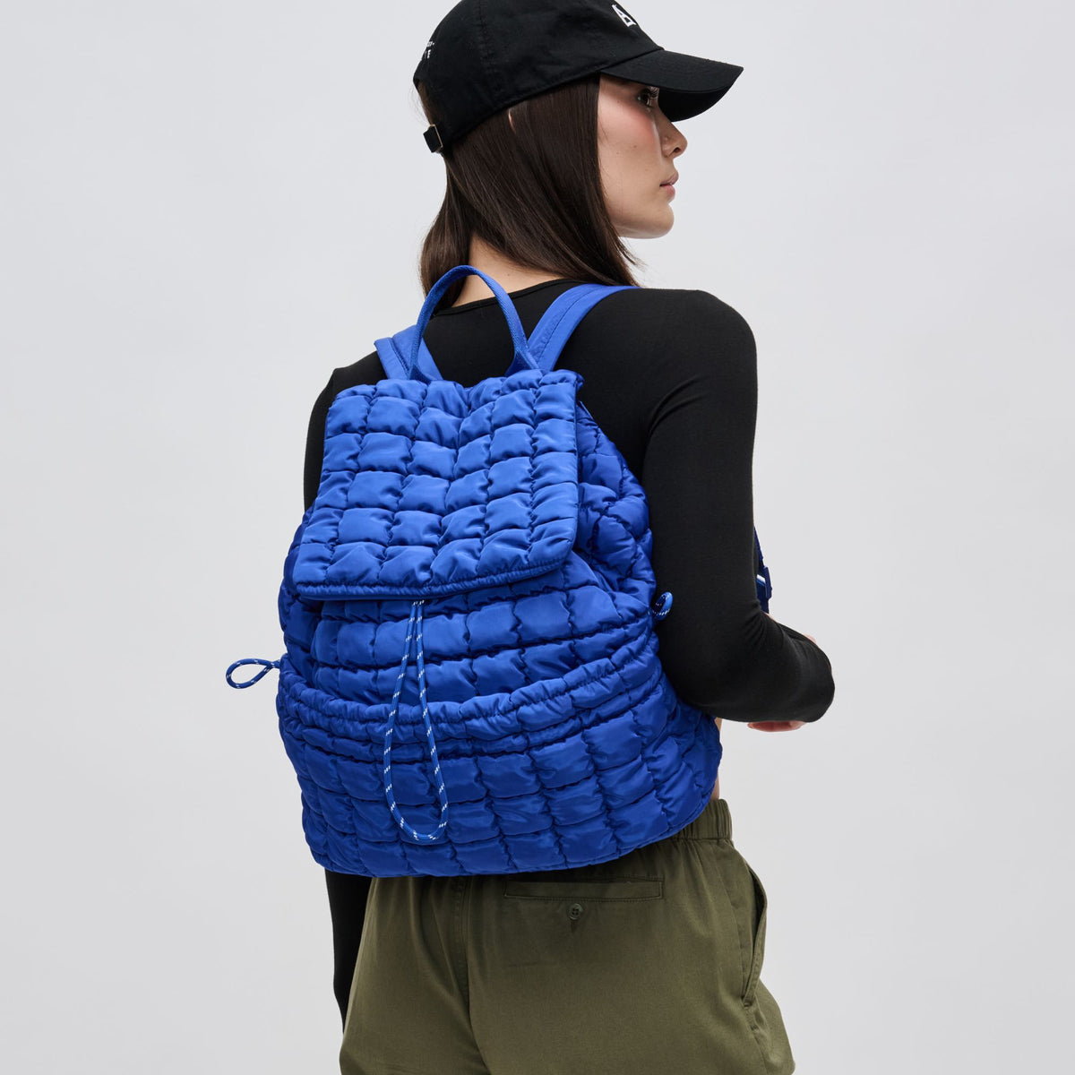 Woman wearing Cobalt Sol and Selene Vitality Backpack 841764108522 View 1 | Cobalt