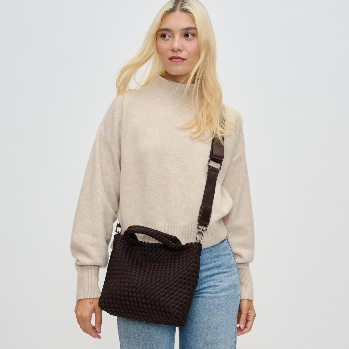 Woman wearing Chocolate Sol and Selene Sky's The Limit - Small Crossbody 841764110280 View 1 | Chocolate