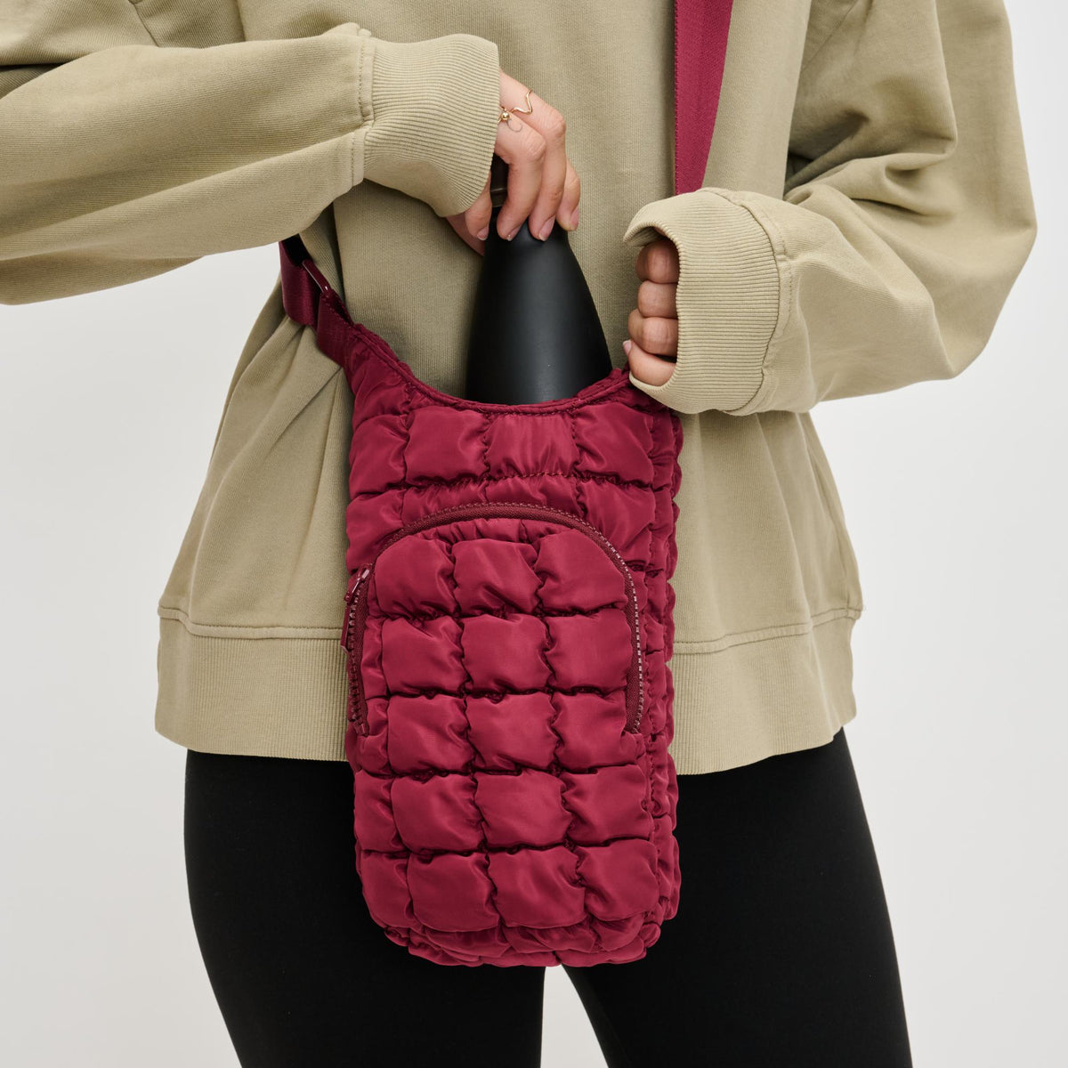 Woman wearing Burgundy Sol and Selene Let It Flow - Quilted Puffer Crossbody 841764110389 View 4 | Burgundy