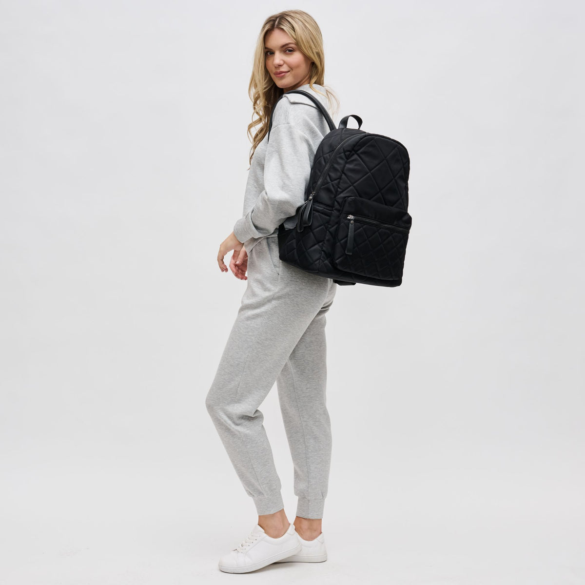 Woman wearing Black Sol and Selene Motivator - Large Travel Backpack 841764101622 View 3 | Black