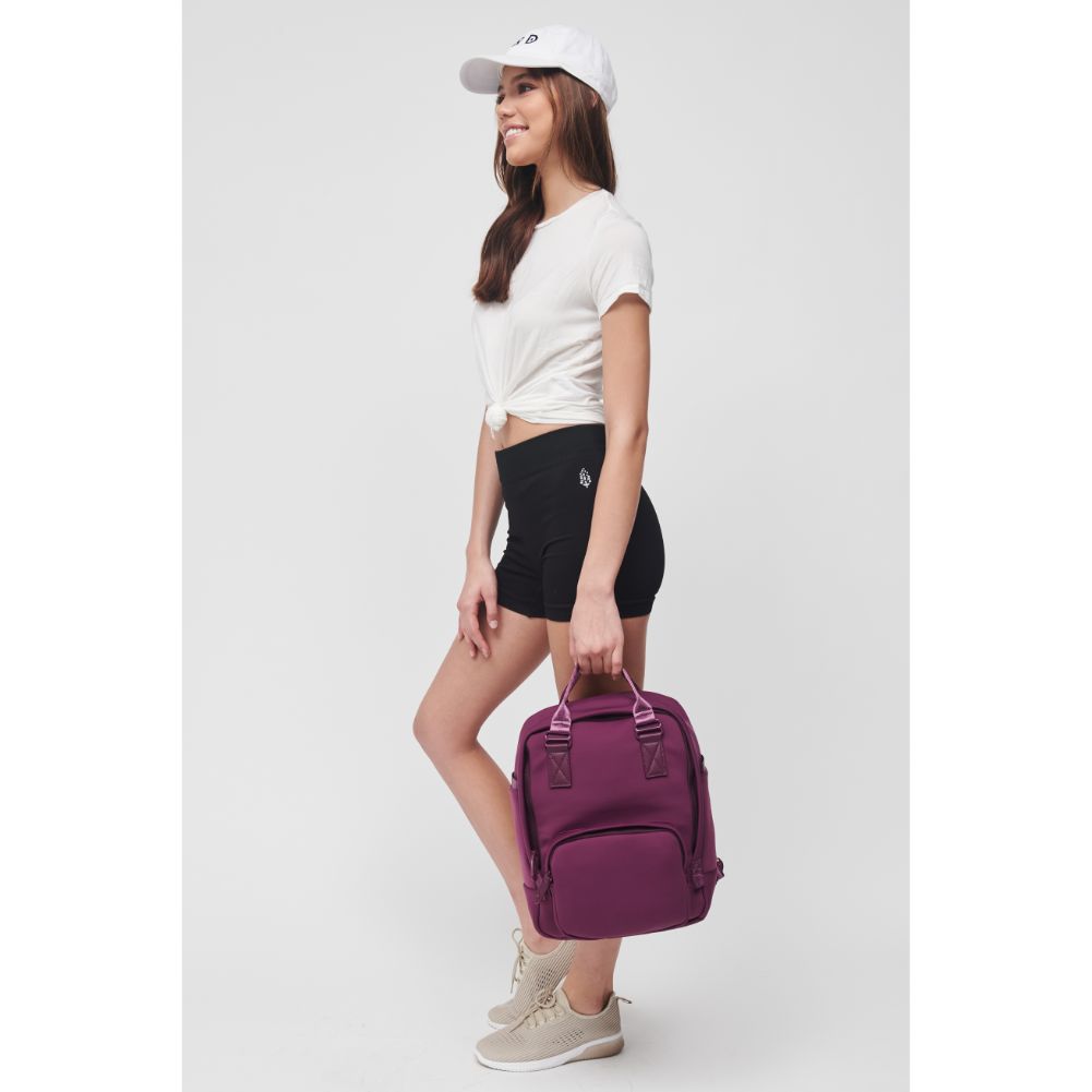 Woman wearing Eggplant Sol and Selene Iconic - Neoprene Backpack 841764106689 View 4 | Eggplant