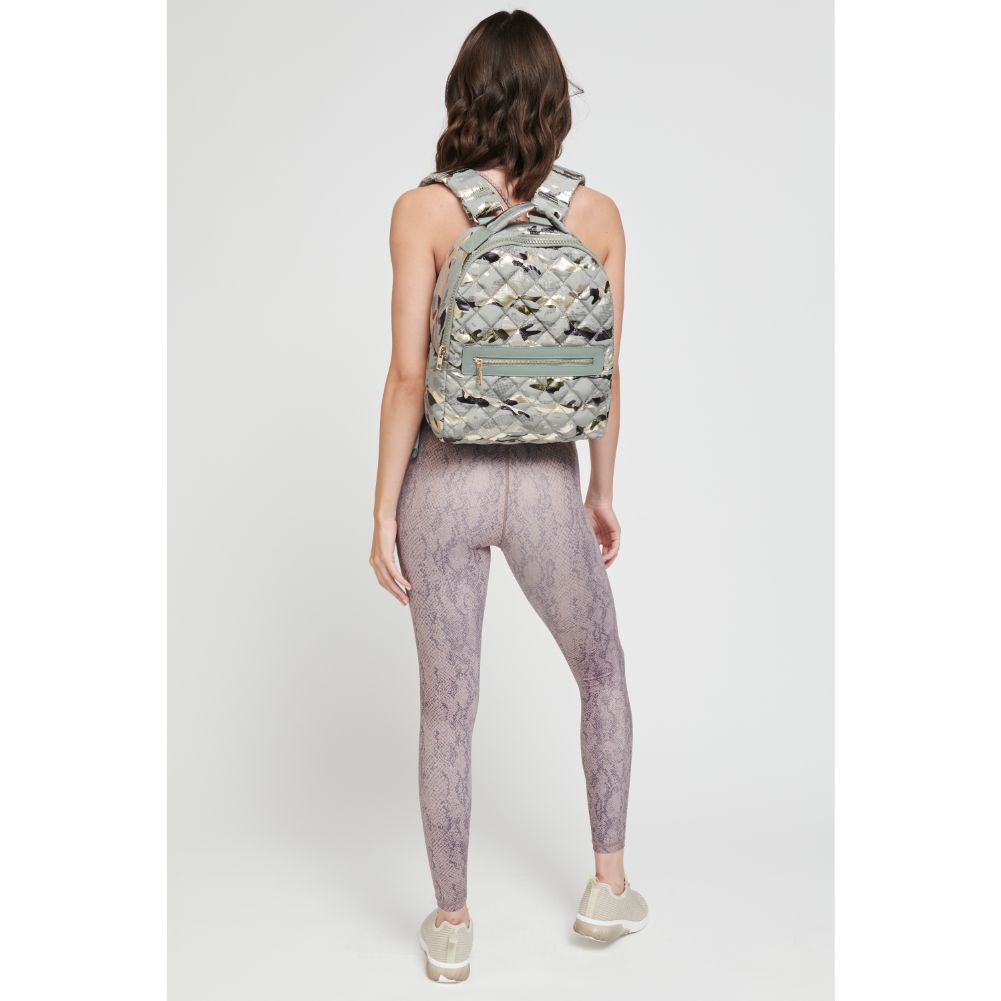 Woman wearing Seafoam Metallic Camo Sol and Selene All Star Backpack 841764105170 View 3 | Seafoam Metallic Camo