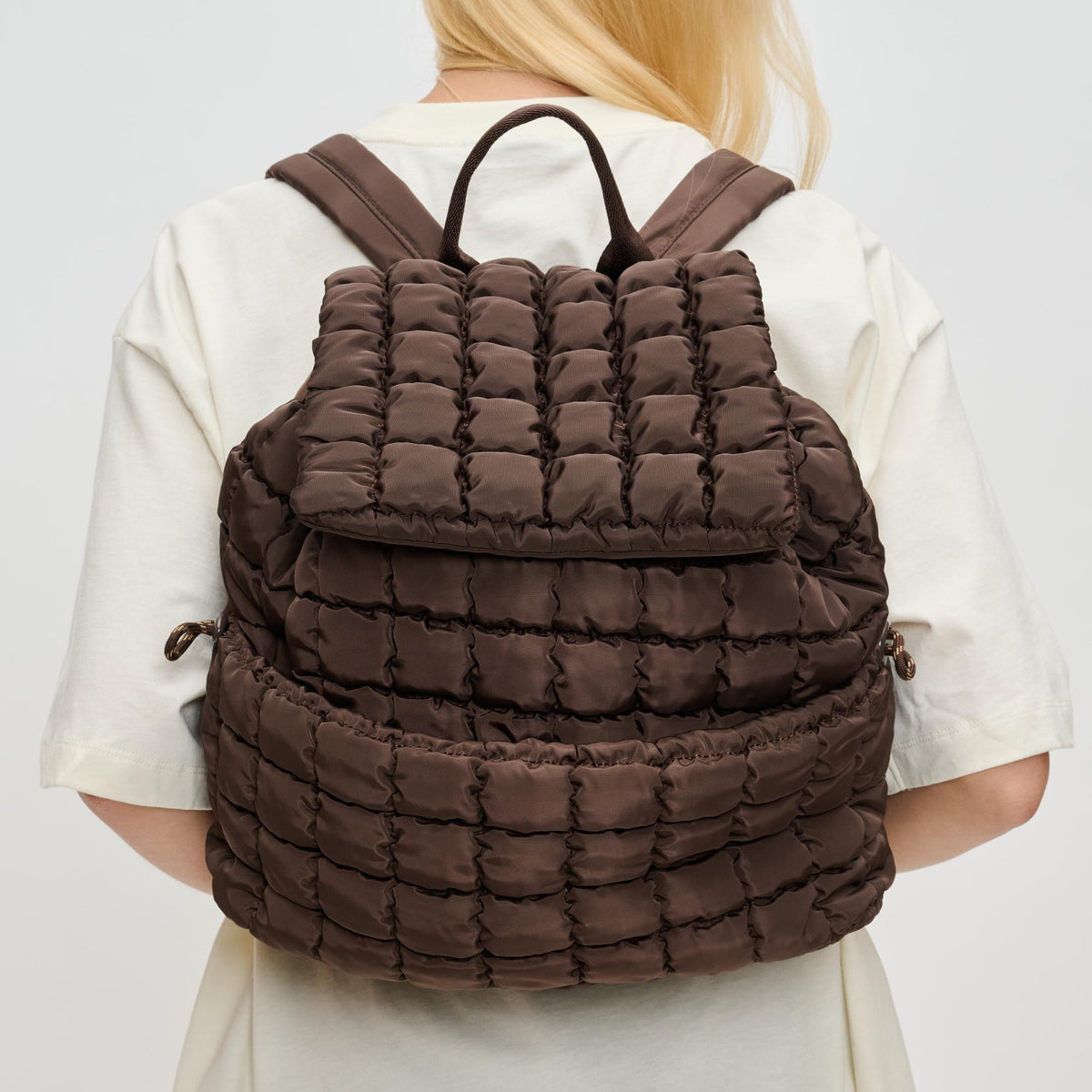 Woman wearing Brown Sol and Selene Vitality Backpack 841764110655 View 1 | Brown