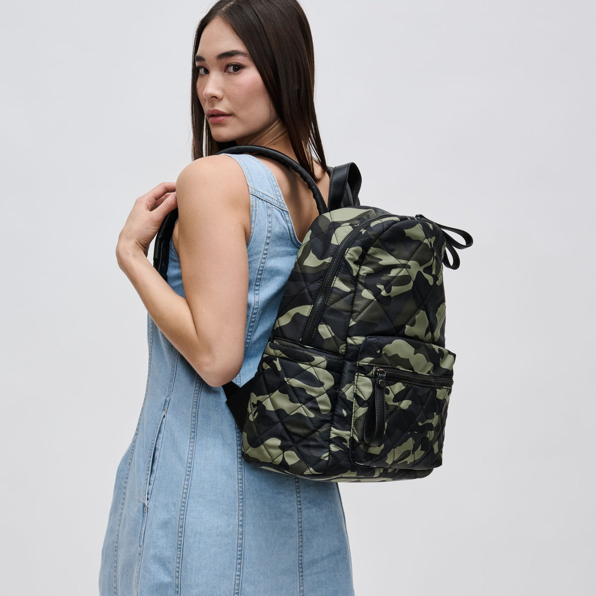 Woman wearing Camo Sol and Selene Motivator - Medium Backpack 841764103954 View 2 | Camo