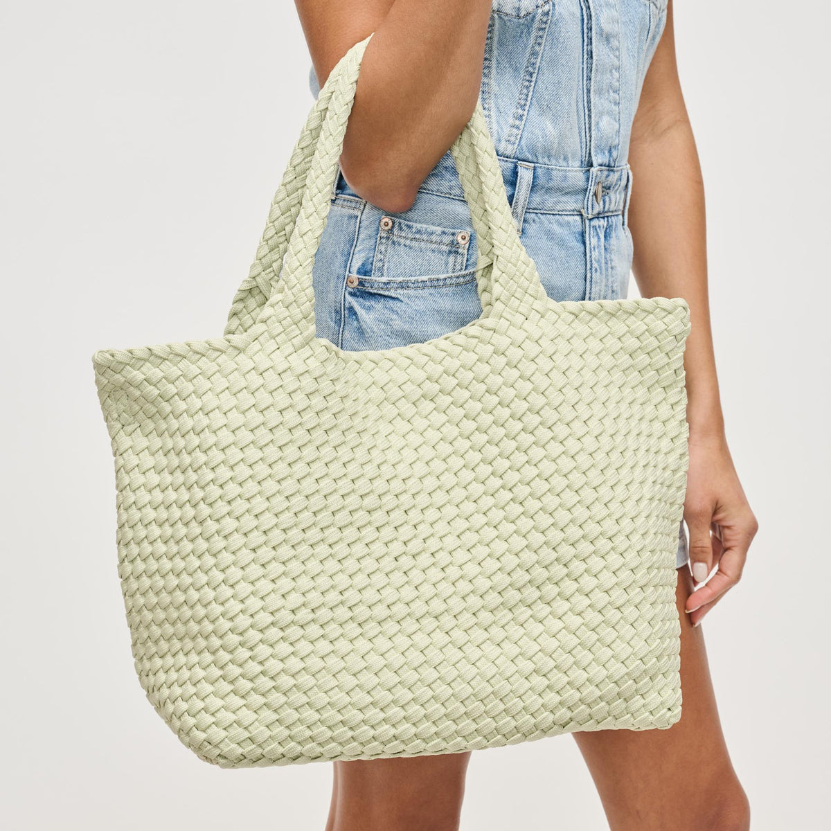 Woman wearing Pistachio Sol and Selene Sky&#39;s The Limit - Medium Sustainable Tote 841764111638 View 2 | Pistachio