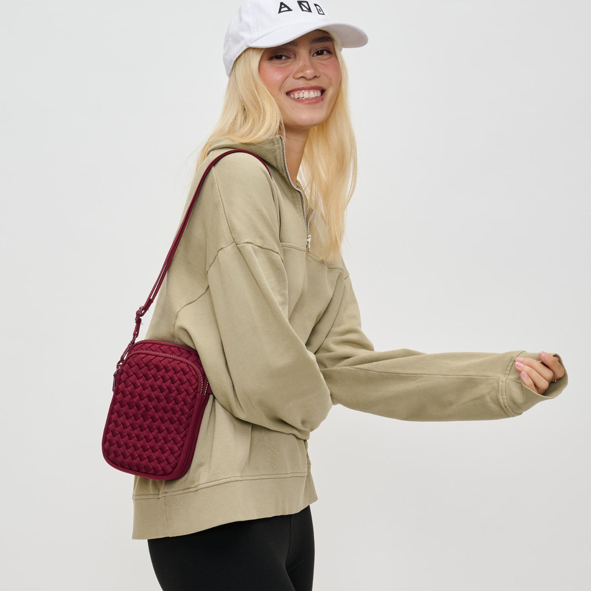 Woman wearing Wine Sol and Selene Divide & Conquer - Woven Neoprene Crossbody 841764110211 View 2 | Wine