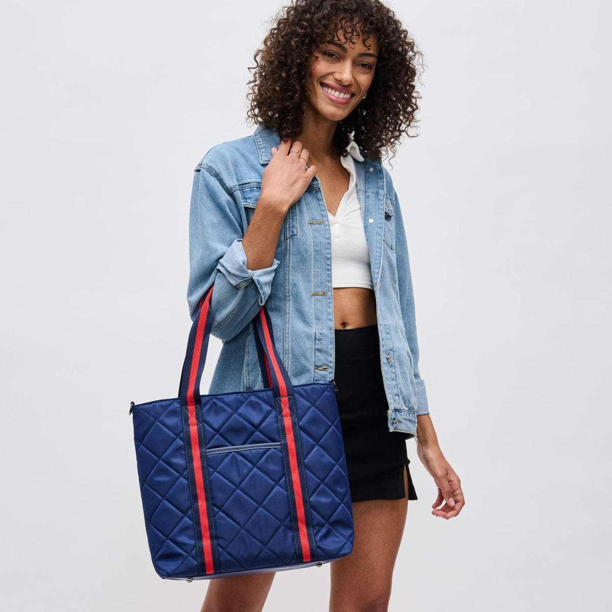 Woman wearing Navy Sol and Selene Motivator Carryall Tote 841764106924 View 1 | Navy
