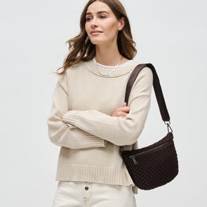 Woman wearing Chocolate Sol and Selene Ethereal - Woven Neoprene Crossbody 841764110853 View 2 | Chocolate