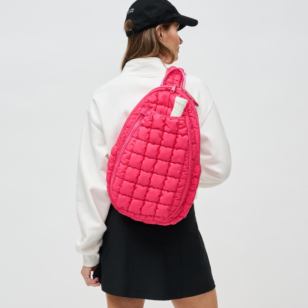 Woman wearing Hot Pink Sol and Selene Match Point - Pickleball &amp; Paddle Tennis Sling Backpack 841764111195 View 1 | Hot Pink