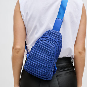 Woman wearing Royal Blue Sol and Selene Beyond The Horizon - Woven Neoprene Sling Backpack 841764108096 View 4 | Royal Blue