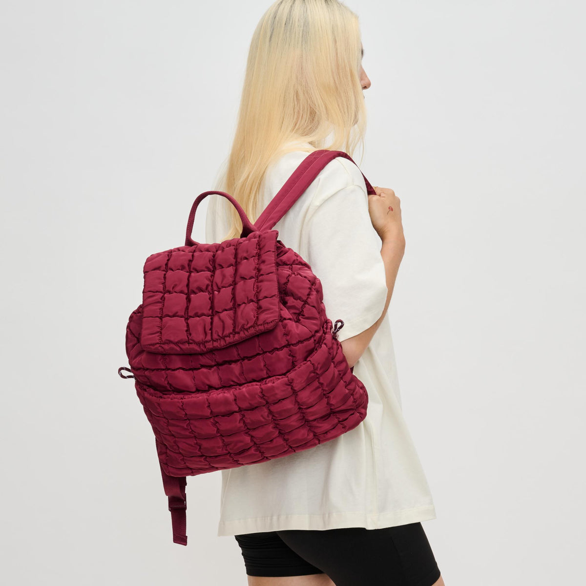 Woman wearing Burgundy Sol and Selene Vitality Backpack 841764110662 View 1 | Burgundy