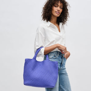 Woman wearing Periwinkle Sol and Selene Sky's The Limit - Medium Tote 841764108799 View 2 | Periwinkle