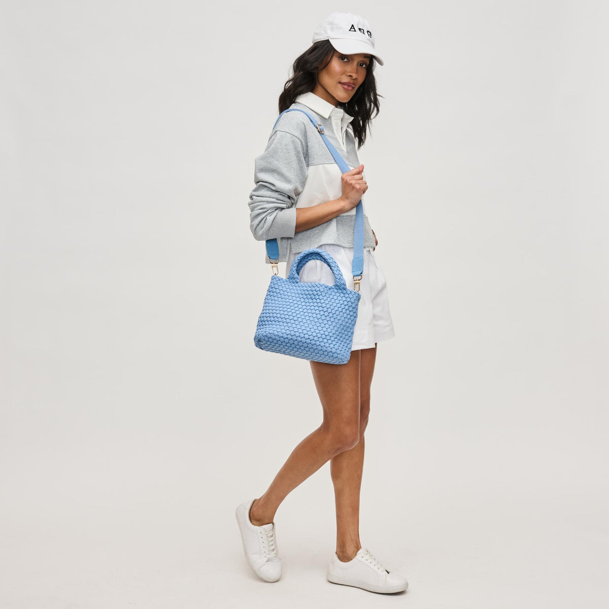 Woman wearing Azure Sol and Selene Sky&#39;s The Limit - Small Sustainable Crossbody 841764111676 View 4 | Azure