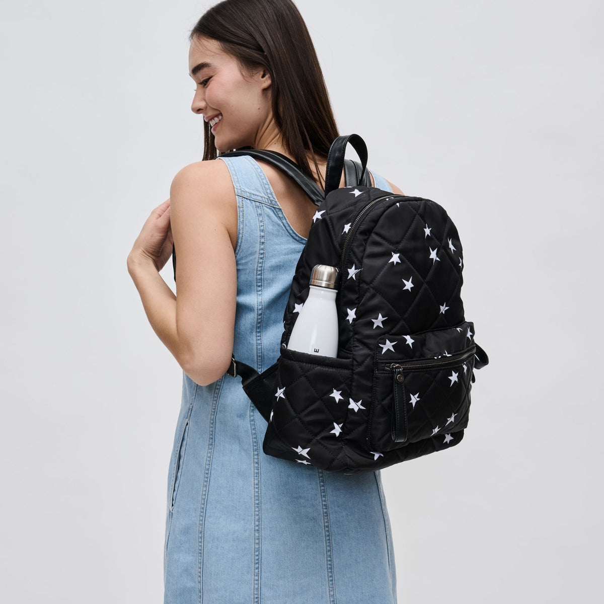 Woman wearing Black Star Sol and Selene Motivator - Medium Backpack 841764103138 View 4 | Black Star