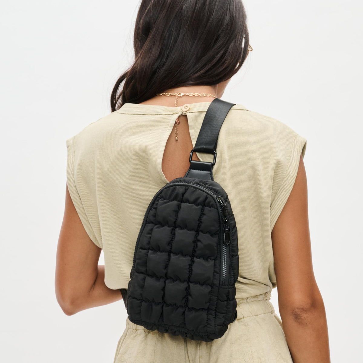 Woman wearing Black Sol and Selene Rejuvenate Sling Backpack 841764108621 View 2 | Black