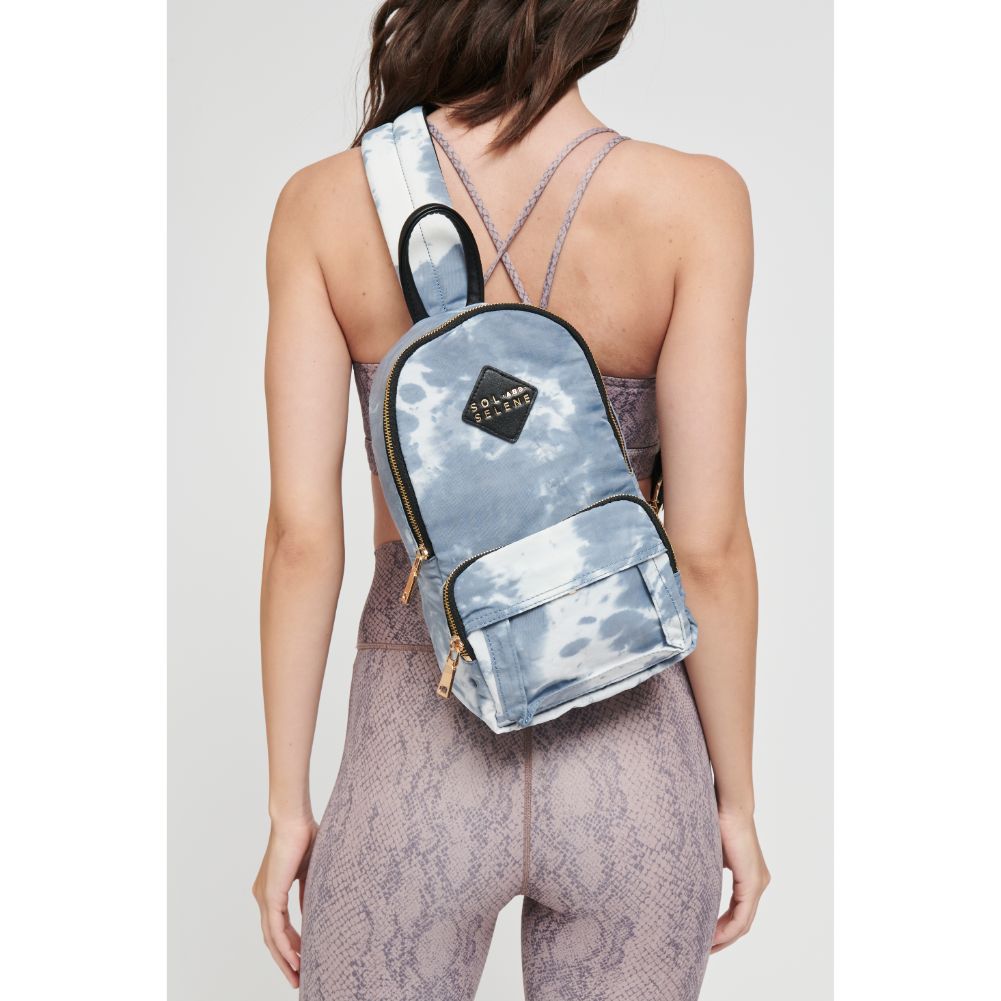 Woman wearing Cloud Grey Sol and Selene Hustle Sling Backpack 841764105552 View 1 | Cloud Grey