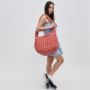 Woman wearing Terracotta Sol and Selene Revive Hobo 841764109550 View 2 | Terracotta