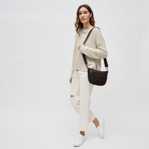 Woman wearing Chocolate Sol and Selene Ethereal - Woven Neoprene Crossbody 841764110853 View 3 | Chocolate