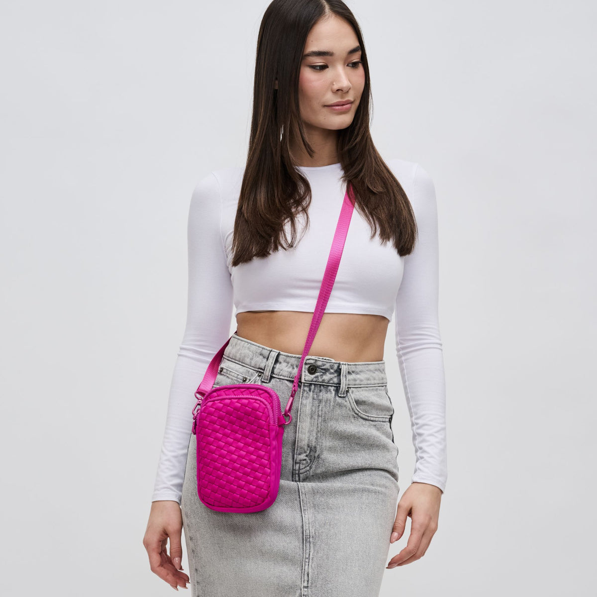 Woman wearing Fuchsia Sol and Selene Divide & Conquer - Woven Neoprene Crossbody 841764108720 View 2 | Fuchsia