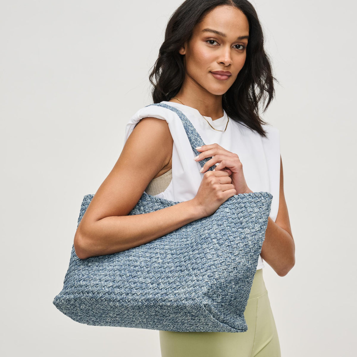 Woman wearing Denim Sol and Selene Sky&#39;s The Limit - Large Denim Tote 841764111348 View 2 | Denim