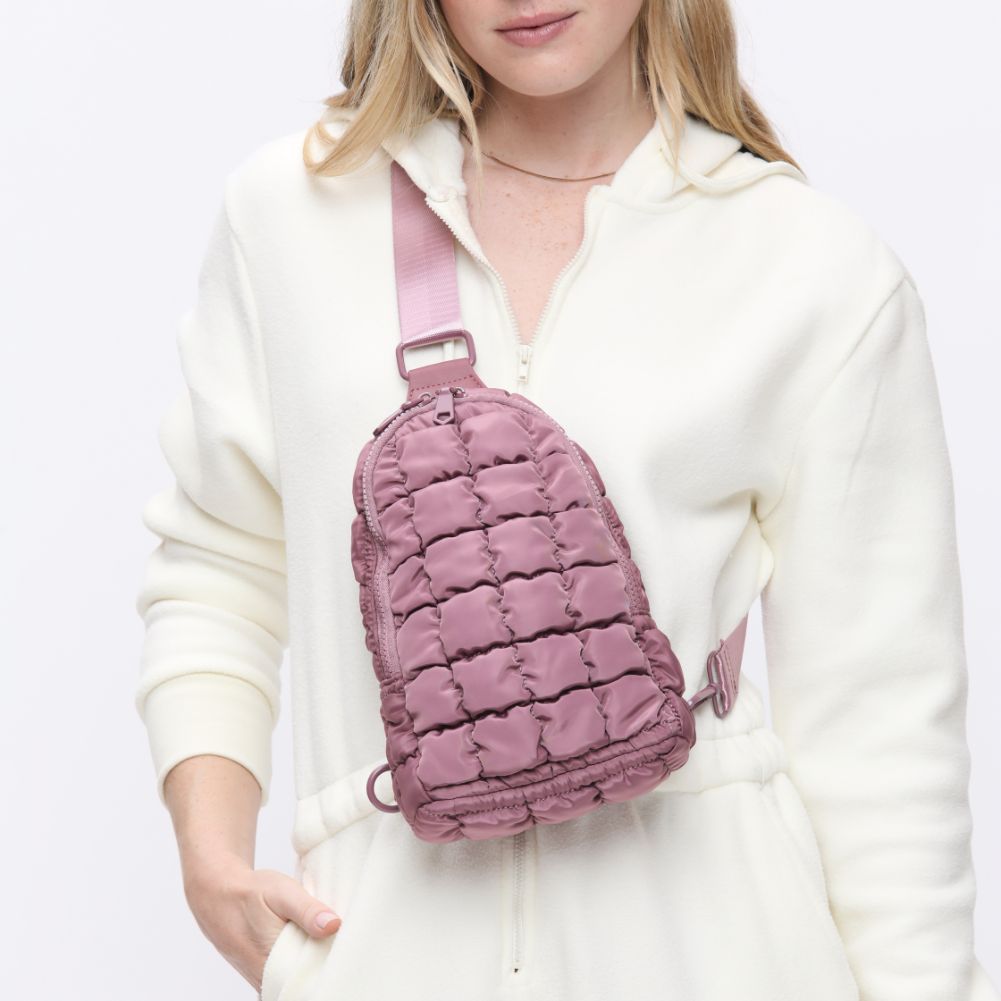 Woman wearing Mauve Sol and Selene Rejuvenate Sling Backpack 841764108676 View 1 | Mauve