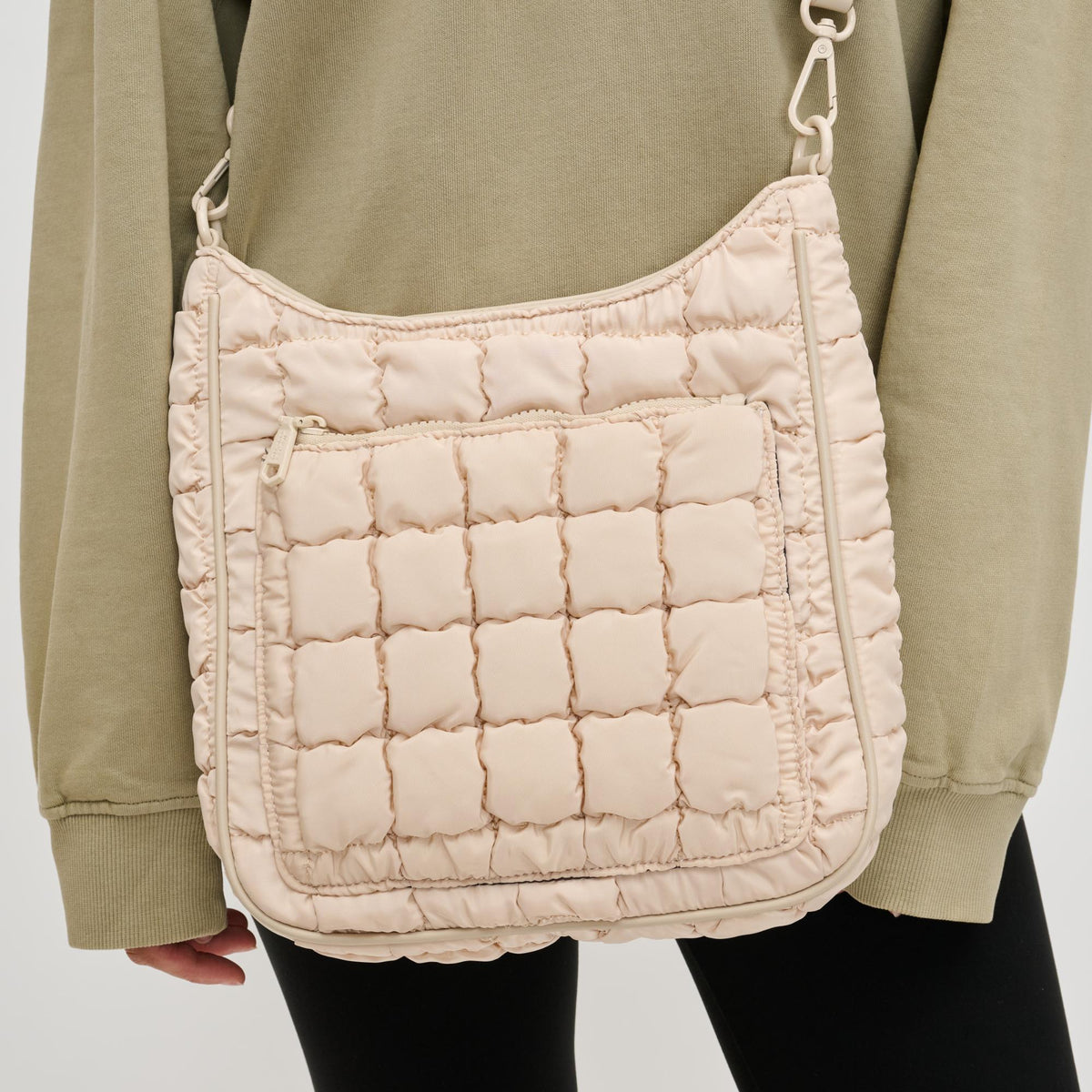 Woman wearing Cream Sol and Selene Aura Crossbody 841764110754 View 3 | Cream