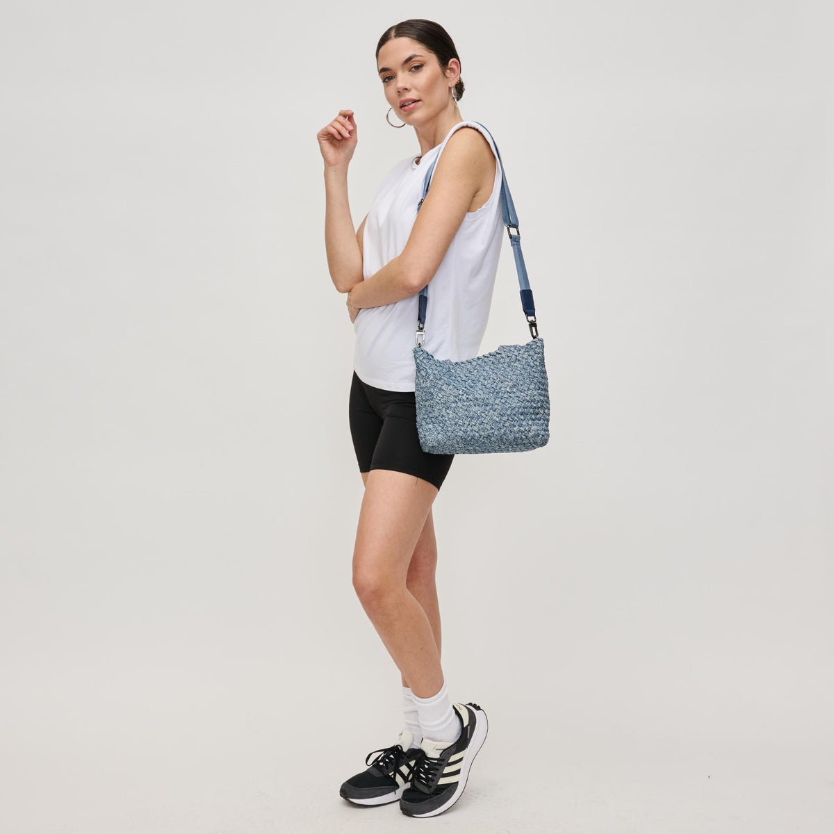 Woman wearing Denim Sol and Selene Sky&#39;s The Limit - Small Denim Crossbody 841764111393 View 2 | Denim