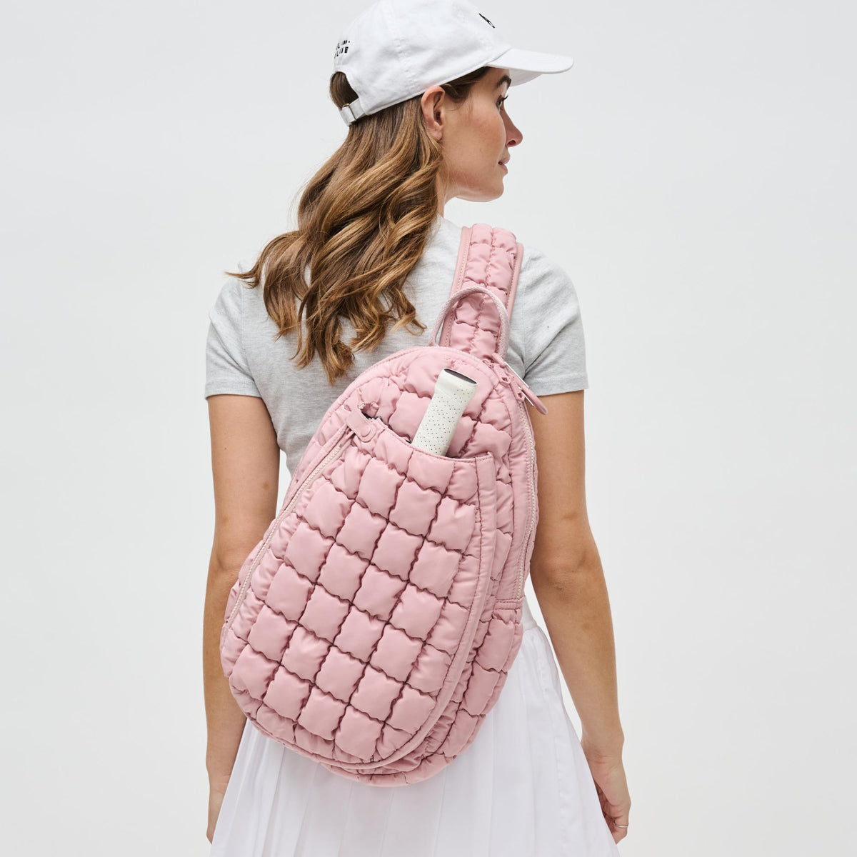 Woman wearing Rose Sol and Selene Match Point - Pickleball & Paddle Tennis Sling Backpack 841764111188 View 1 | Rose