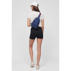 Woman wearing Navy Sol and Selene Motivator Sling Backpack 841764106894 View 2 | Navy