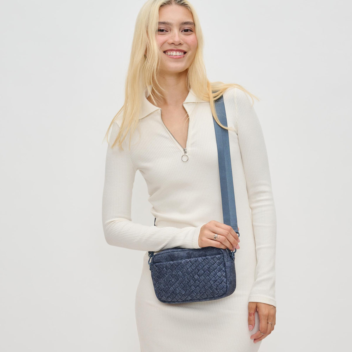 Woman wearing Dark Denim Sol and Selene Inspiration - Woven Neoprene Crossbody 841764110501 View 2 | Dark Denim