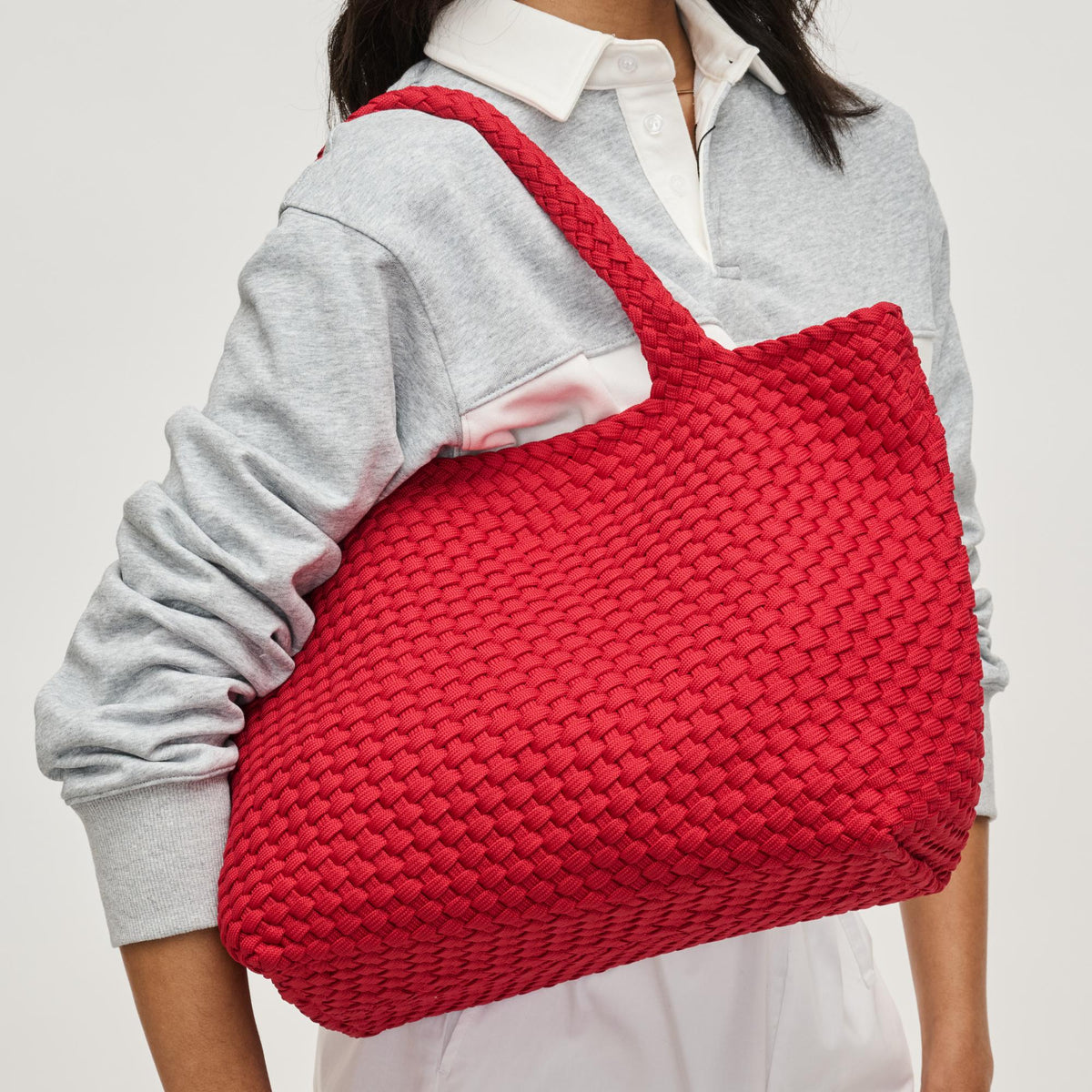 Woman wearing Red Sol and Selene Sky&#39;s The Limit - Medium Sustainable Tote 841764111645 View 1 | Red