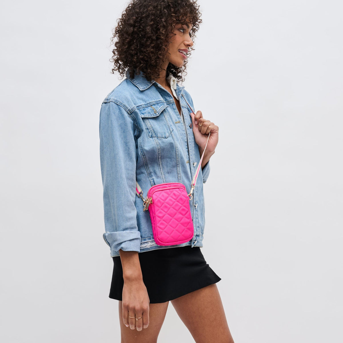 Woman wearing Magenta Sol and Selene Divide &amp; Conquer - Quilted Crossbody 841764108027 View 2 | Magenta