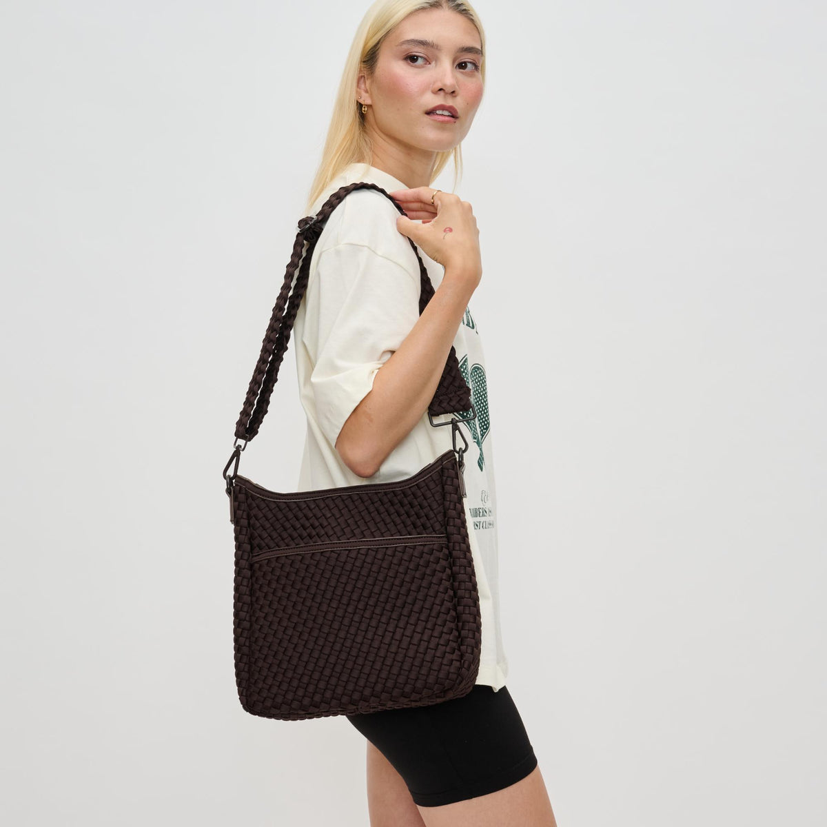 Woman wearing Chocolate Sol and Selene Kismet - Woven Neoprene Crossbody 841764110167 View 2 | Chocolate