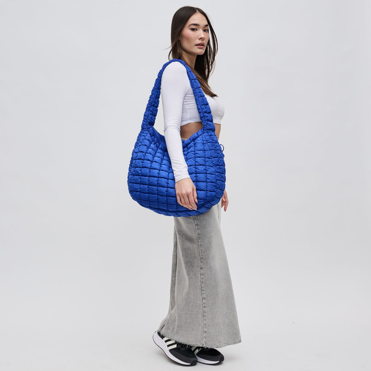 Woman wearing Cobalt Sol and Selene Revive Hobo 841764108577 View 2 | Cobalt